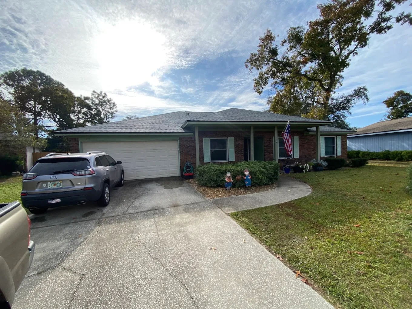 Residential exterior before or in-progress view from driveway